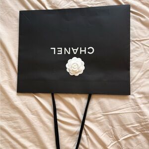 Chanel Black Bag with White Camellia